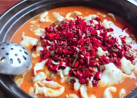 Spicy fish fillet with pickled vegetables